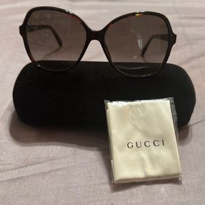 Gucci sunglasses.